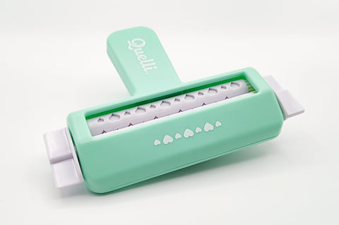 CORRUGADOR DE PAPEL COLOR MENTA CON DISEÑO CORAZONES